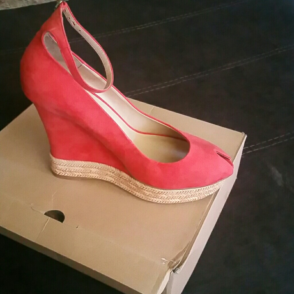 Peep toe suede wedge shoe....